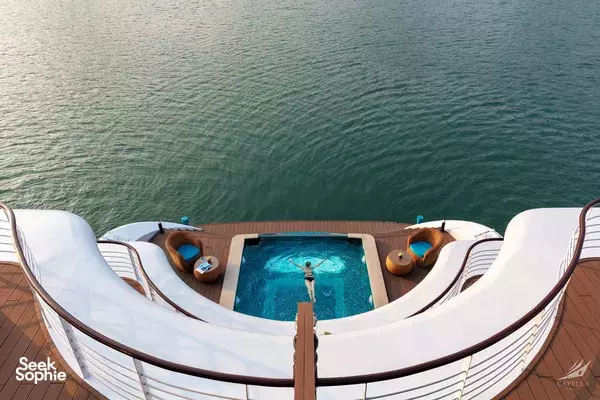 Deck plunge pool on Lyra Cruise Collection’s luxury cruise, framed by calm green water at sea on Halong Bay