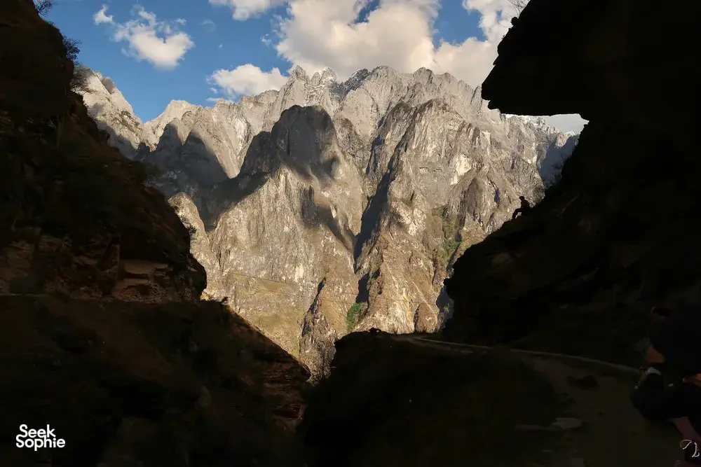 Dramatic cliffs and snow-capped peaks overlooking Tiger Leaping Gorge on a 2D1N high-trail hike from Lijiang