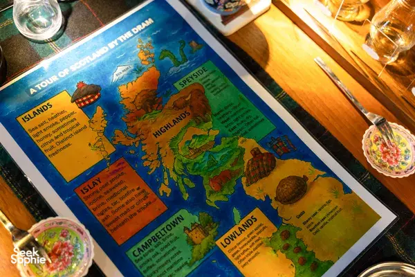 Scotland the Dram tasting map on the table, used for whisky storytelling during a small-batch whisky tasting in Singapore