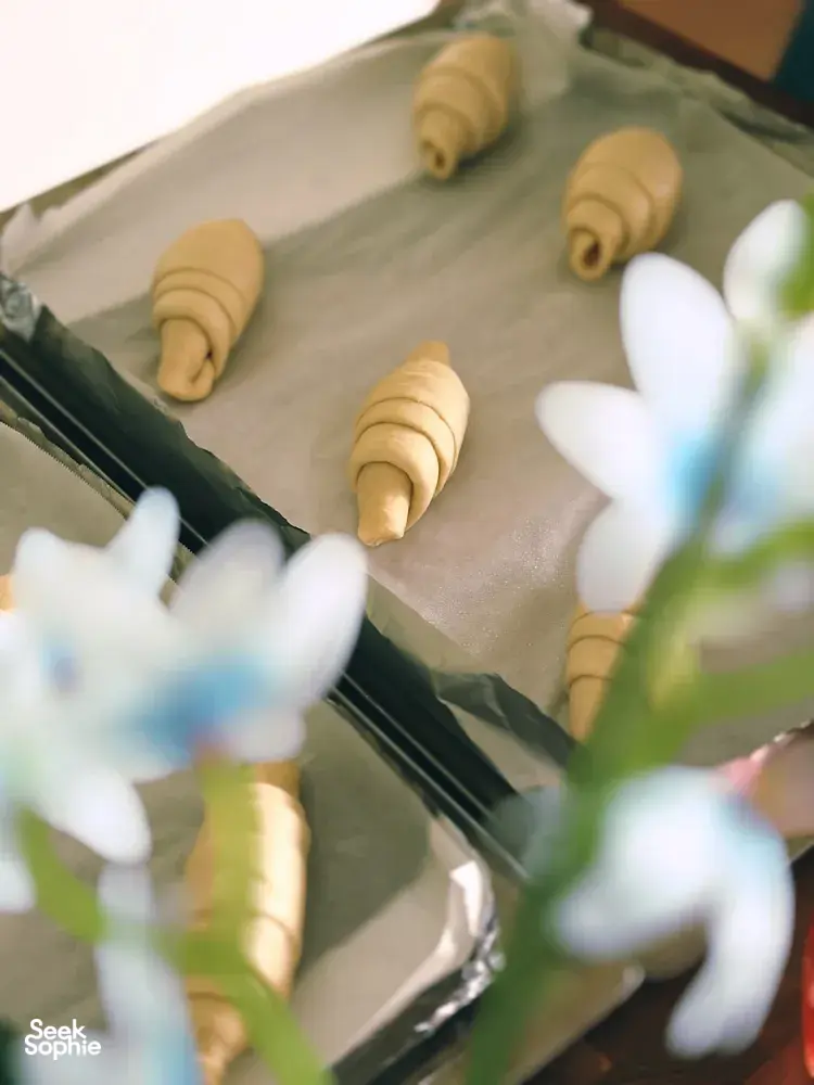Crescent shio pan dough pieces on a tray, prepped for baking with The Daily Staples, workshops in Singapore