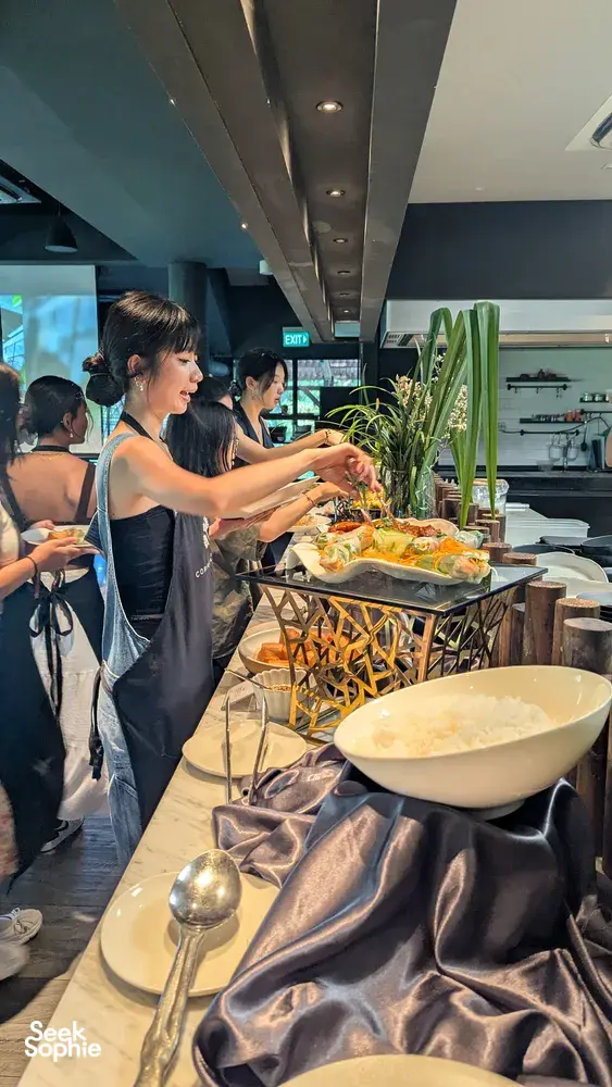 Participants prepare ingredients at Coriander Leaf’s Singapore kitchen for the Local Produce Cooking Challenge, workshops in Singapore