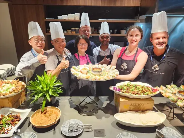 Coriander Leaf staff present prepared dishes and platters during the Local Produce Cooking Challenge for Teams in Singapore