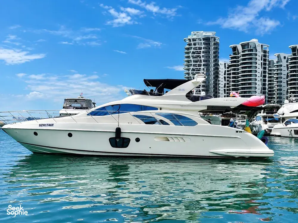 Zen Sea yacht at a Singapore marina beside other boats, ready for a 4-hour voyage to Lazarus Island today