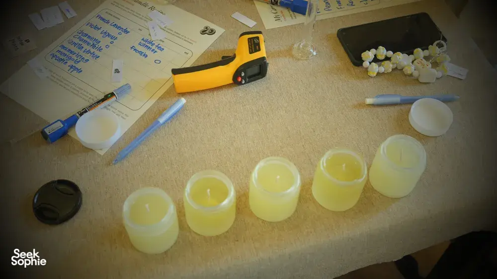 Coco-soy wax cups and fragrance tools laid out for blending with Perfume Play, a candle workshop in Singapore