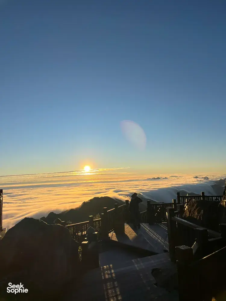 Sunrise view from a viewpoint terrace overlooking the cloud sea in Sapa during a 1-day eco trek, at Mt Fansipan