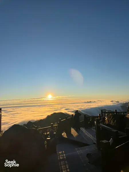 Sunrise view from a viewpoint terrace overlooking the cloud sea in Sapa during a 1-day eco trek, at Mt Fansipan