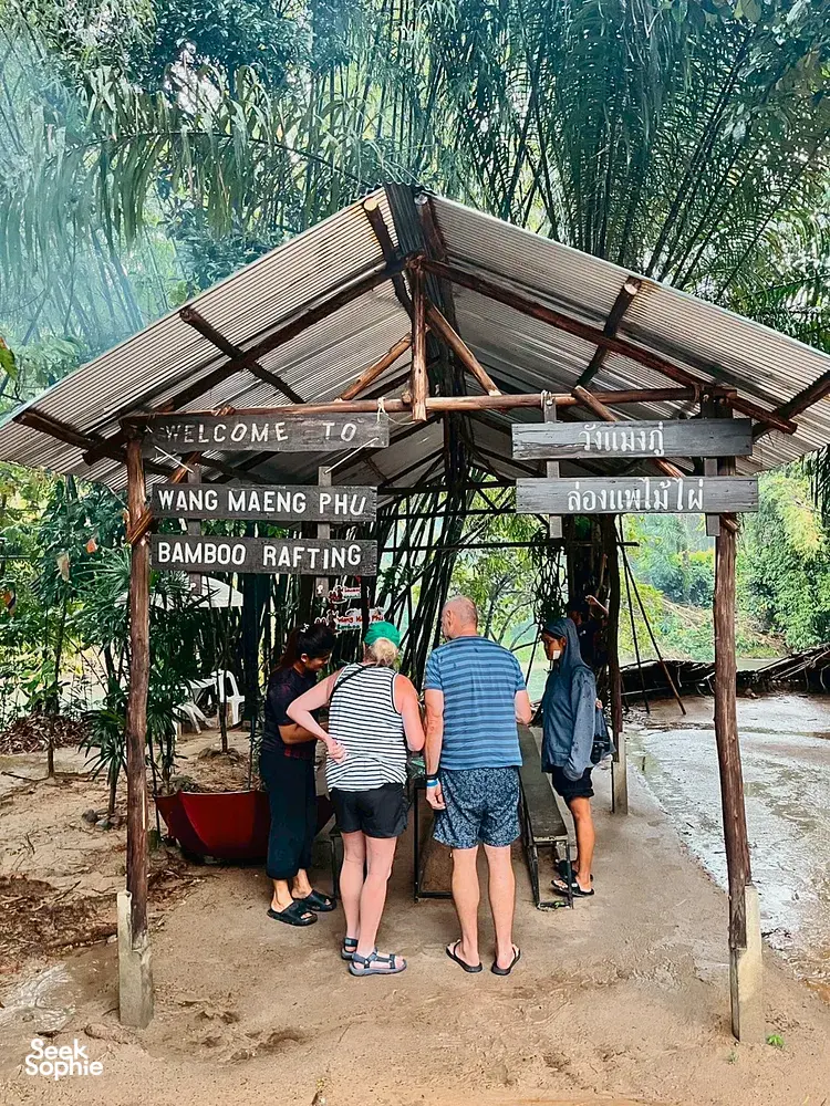 Guests enter a bamboo rafting station at Wang Maeng Phu, preparing for Half-Day Cycling & Rafting in Khao Lak