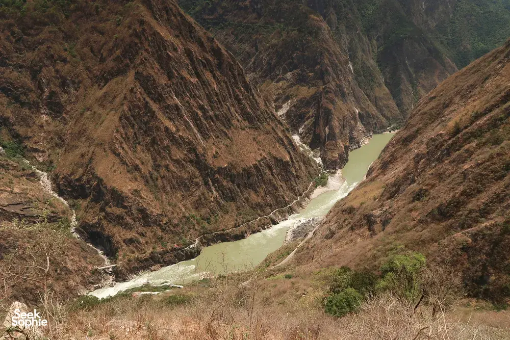 River winding through a steep gorge in Tiger Leaping Gorge, Lijiang, seen from the high trail on a 2D1N trek