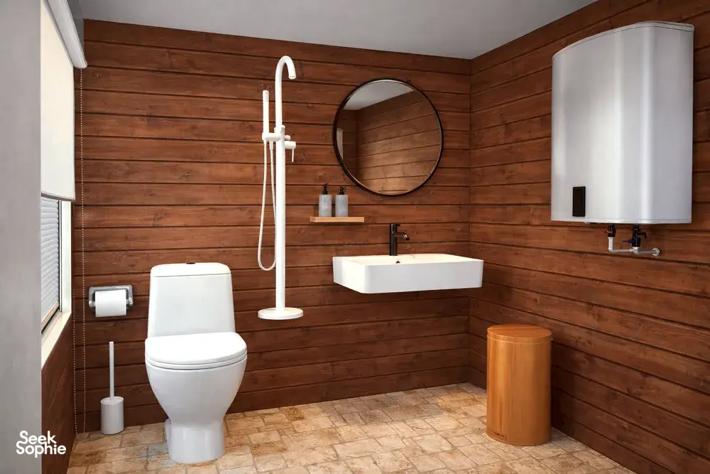 Clean modern bathroom on a wooden phinisi boat with toilet, sink and shower fixtures along wood panelling for a trip in Komodo Island