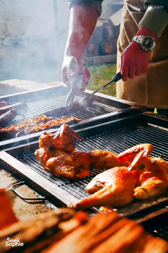 Grilled chicken over a camp barbecue during a 2D2N Tibetan mountain valley stay with Caravan Treks by Ferme Liotard in Shangri-La