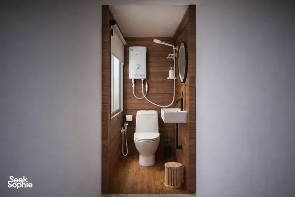 Wood-panel en-suite bathroom with toilet and sink in a wooden phinisi cabin on a Komodo cruise, Labuan Bajo