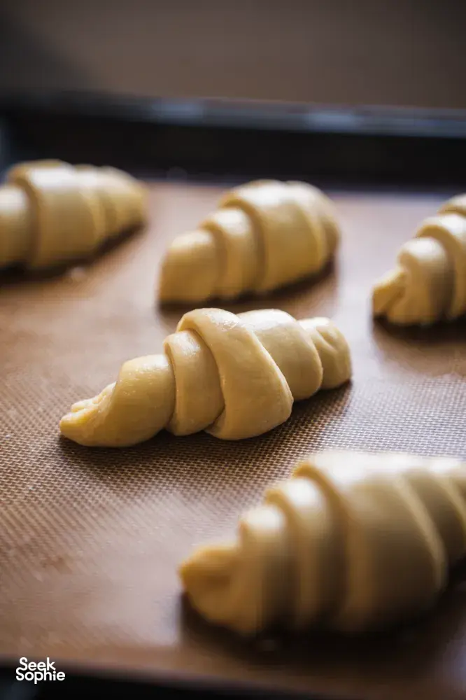 Croissant dough rolls on a baking mat, close-up at a French Cooking Lab class in Singapore, workshops in Singapore
