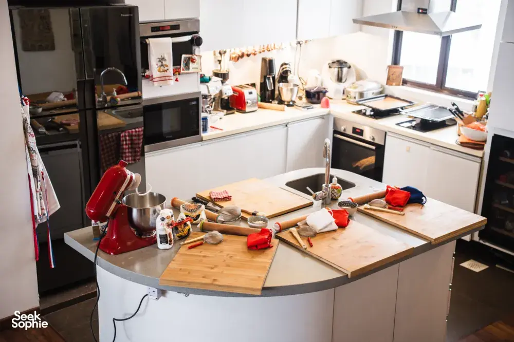 Well-equipped French home kitchen with mixers, ovens, and baking tools prepared for croissant workshop in Singapore