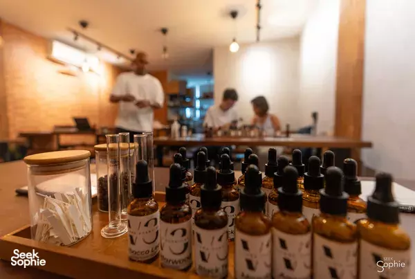 Essential oil blending bottles and droppers on the table at Vcube Scenting workshops in Singapore, ready to mix scents