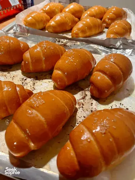 Freshly baked golden shio pan buns on a tray, made for a The Daily Staples workshop in Singapore today