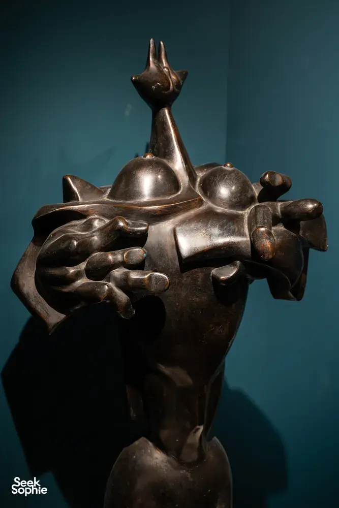 Bronze sculpture in a display case at Quang San Art Museum on an expert-led Vietnamese art tour in Ho Chi Minh City