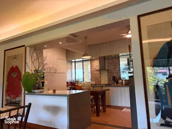 Community kitchen with bar counter and pendant lights for baking bread and making dips from edible plants — workshops in Singapore