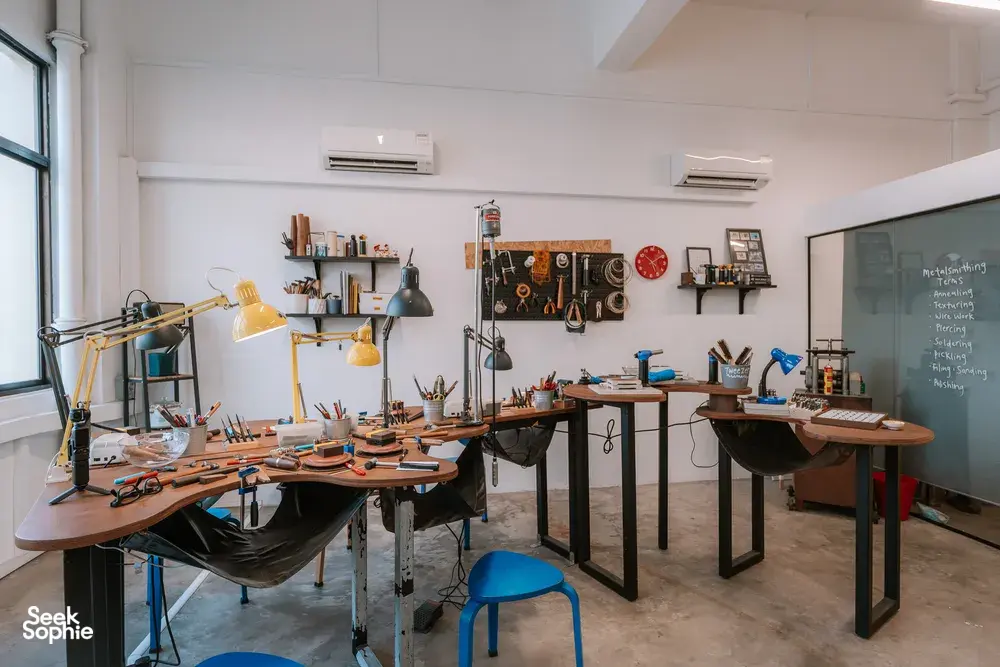 Metalsmithing studio with workbenches, lamps and tools at Fat Anvil Studios in Singapore, workshops in Singapore