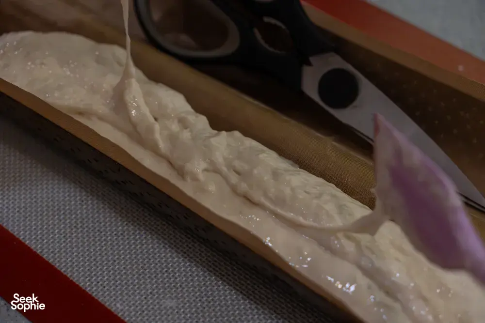 Baguette dough on a baking tray in the cosy loft kitchen with French Cooking Lab in Singapore — workshops in Singapore