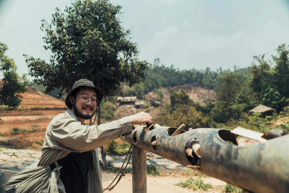 If you get to feed elephants, make sure you're feeding them indirectly - like through a tube here!