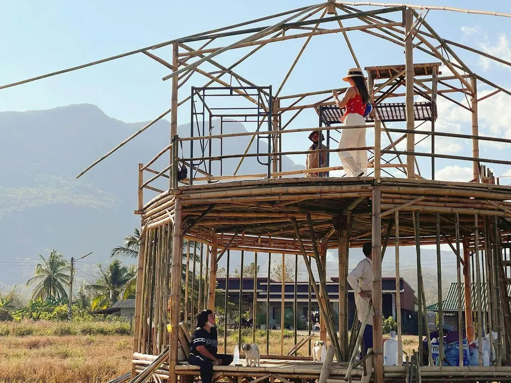 Locals came to help her build her home!