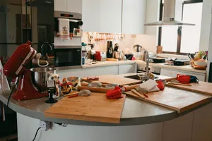 Baking station in a Singapore kitchen with trays, tools and an oven, ready for croissant-making at French Cooking Lab today