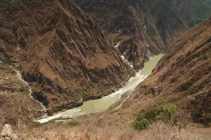 River winding through a steep gorge in Tiger Leaping Gorge, Lijiang, seen from the high trail on a 2D1N trek