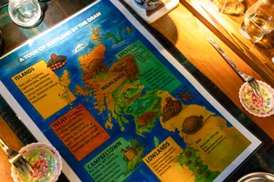 Scotland the Dram tasting map on the table, used for whisky storytelling during a small-batch whisky tasting in Singapore