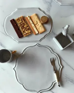 Antique European-style serving set on a marble table with appetisers, styled at Ina Atelier, workshops in Singapore
