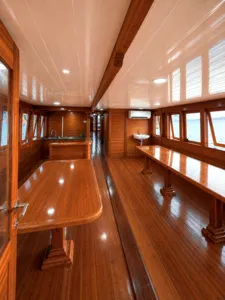 Wooden phinisi bathroom with bathtub and washbasin beside windows for a 3D2N shared Komodo cruise onboard, Komodo Island