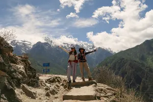 Hikers on stone steps with backpacks in the mountains along Tiger Leaping Gorge, Lijiang, during a 2D1N high-trail trek