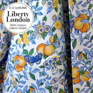 Liberty London floral cotton fabric panels laid out for sewing reusable food wraps with Agrihome at sustainability workshops in Singapore