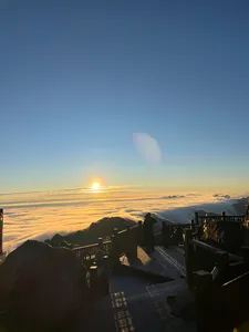 Sunrise view from a viewpoint terrace overlooking the cloud sea in Sapa during a 1-day eco trek, at Mt Fansipan
