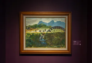 Large framed landscape painting on display at Quang San Art Museum in Ho Chi Minh City