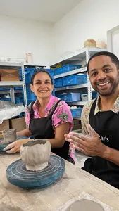 Join hands-on workshops in Singapore at 3Arts Pottery, where a host guides hand-building clay on a wheel