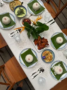 Table set with rice, curries and fried sides at Kebun Lidstari in Langkawi, where Malaysian comfort food is served