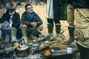 Around a campfire at a Ferme Liotard-hosted nomadic caravan campsite in Shangri-La’s high valleys, pots and cups cooking