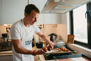 Eric shapes croissant dough in Singapore at French Cooking Lab during a French-chef baking class session