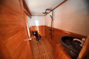 Boat bathroom with shower fittings and sink on a 3D2N join-in Komodo trip from Labuan Bajo to Komodo Island