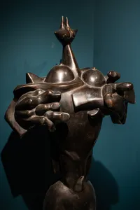 Bronze sculpture in a display case at Quang San Art Museum on an expert-led Vietnamese art tour in Ho Chi Minh City