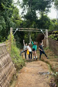 Group hiking the Coral Cave nature trail on a private Cheow Lan day trip through Khao Sok National Park