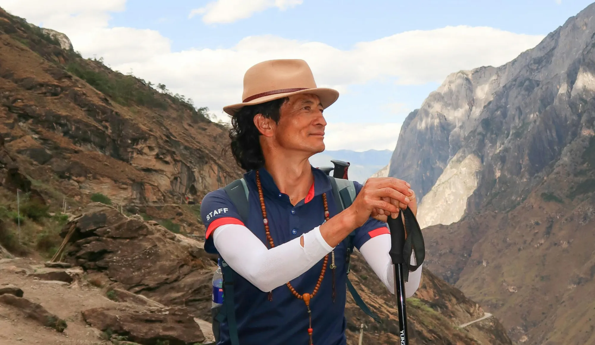 He left his village. Now, he's coming back to build a guesthouse.